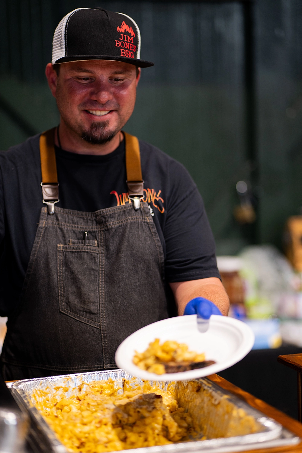 Person serving food at an event at Biane Brothers Winery